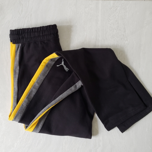 Brand new Puma sweatpants for kid's or women. Black with yellow and gray stripes - Picture 3 of 5
